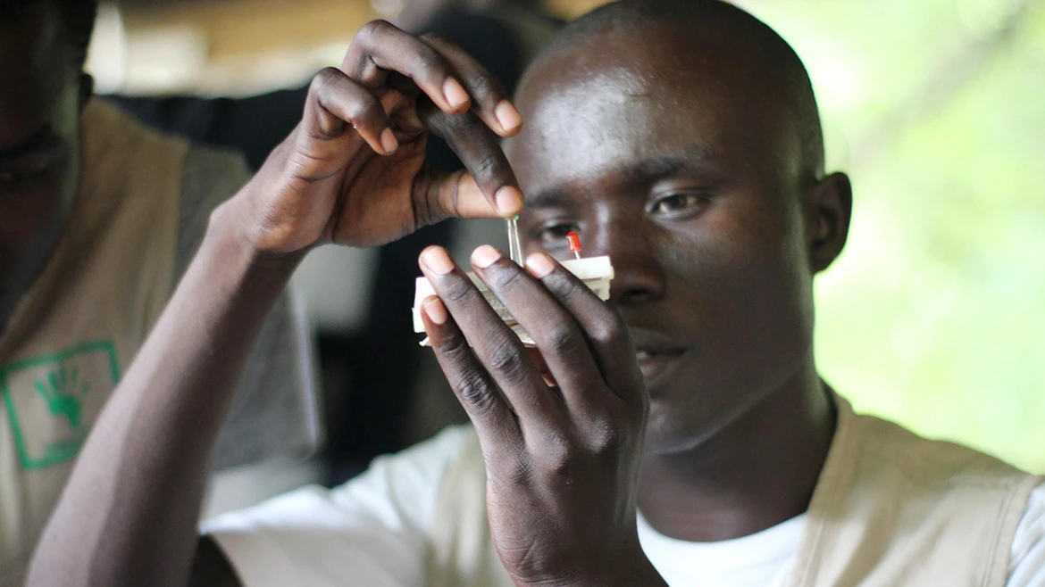A person working on an electronic device